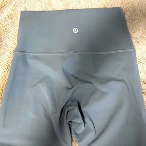 Baby blue lululemon size 4 leggings. Worn once.